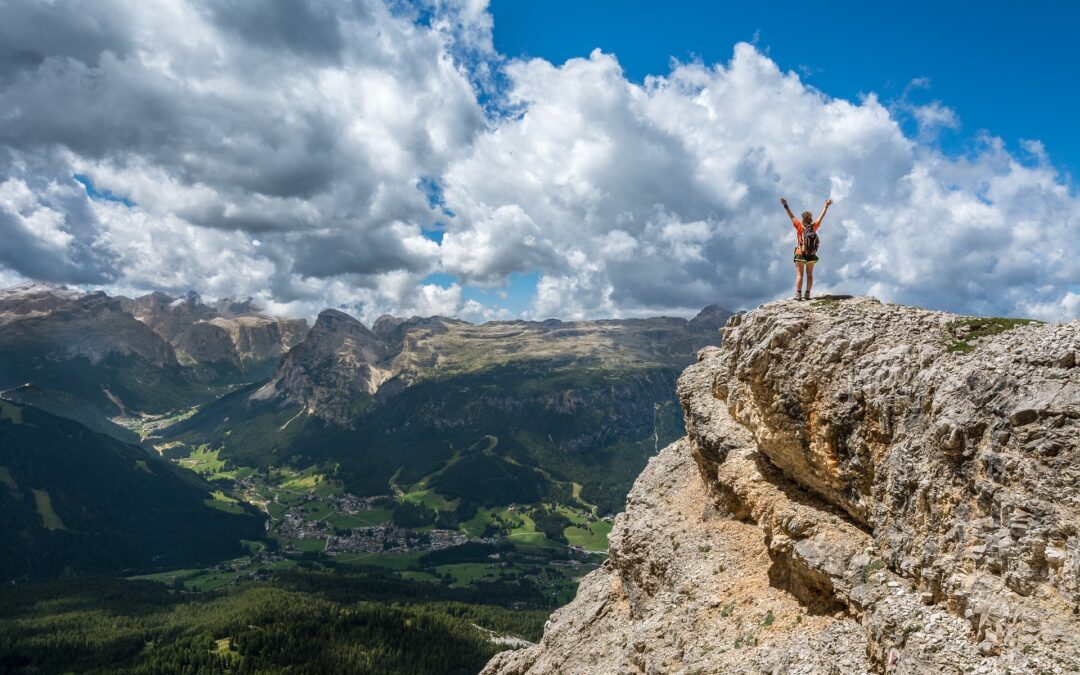 stock-image-of-person-on-hill-top